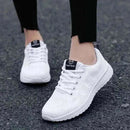 Women in White Sneakers 
