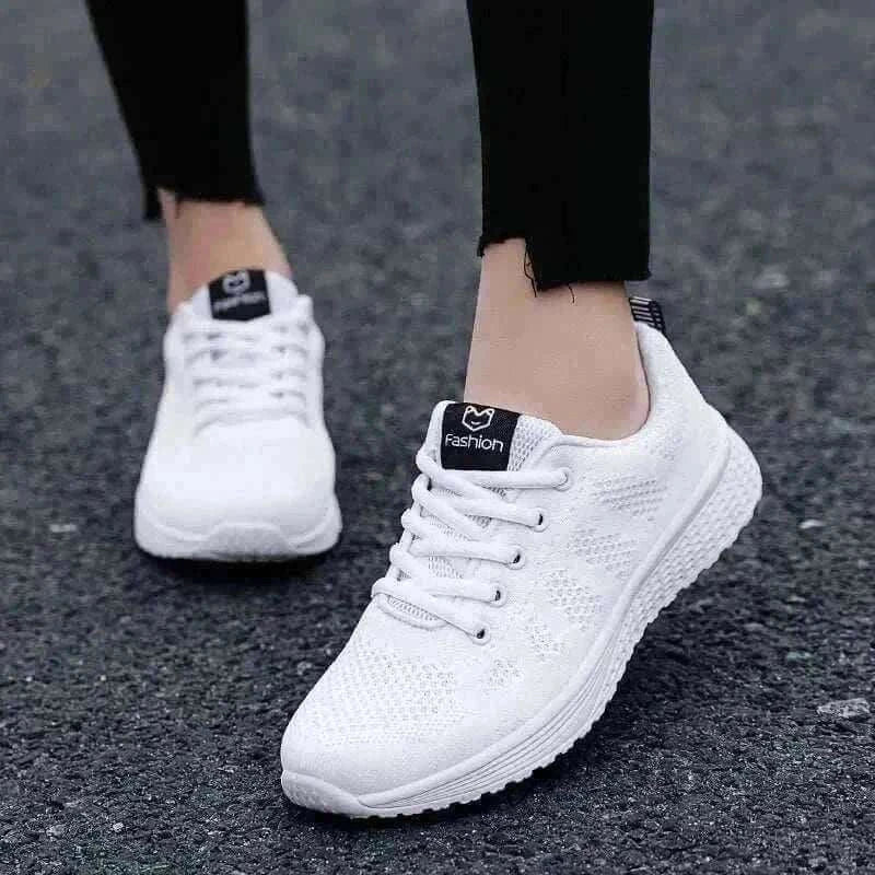 Women in White Sneakers 
