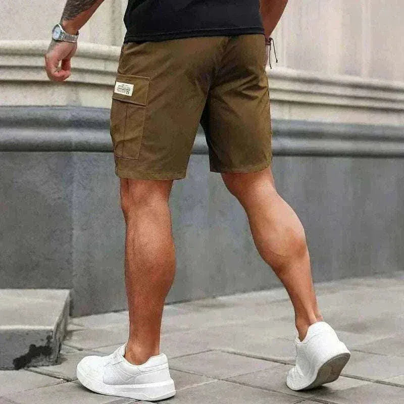 Man In Khaki Cargo Shorts  for Outdoor Work or Hiking Back View